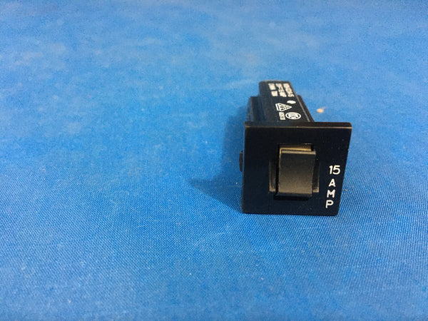 Tyco Circuit Breaker, 15 AMP Push Thru, Model:W28XQ1A-15 NSN:5925-01-258-2129