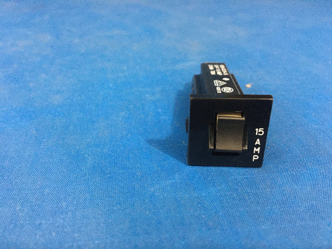 Tyco Circuit Breaker, 15 AMP Push Thru, Model:W28XQ1A-15 NSN:5925-01-258-2129